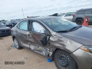 2018 Toyota Corolla L with VIN 2T1BURHE1JC983389, listed as a IAAI auction lot 42221142 with 79,113 mi miles and . Bid and sale history available at DreamBid. Image 6.