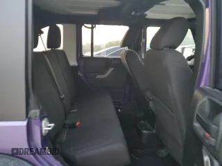 2018 Jeep Wrangler JK Unlimited Sport S with VIN 1C4BJWDG2JL837817, listed as a Copart auction lot 71153094 with 74,396 mi miles and Salvage Title. Bid and sale history available at carsss.com. Image 11.