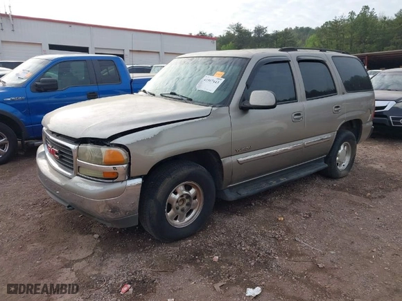 2003 GMC Yukon SLT with VIN 1GKEC13Z33R161136, listed as a IAAI auction lot 41907443 with 325,842 mi miles. Bid and sale history available at carsss.com. Image 2.