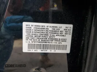 2015 Honda Pilot SE z VIN 5FNYF4H33FB074515, wystawiony jako Copart lot #54758015 z przebiegiem 148 493 mil mil oraz Szkoda całkowita • Salvage title. Historia ofert i sprzedaży dostępna na DreamBid. Obrazek 13.