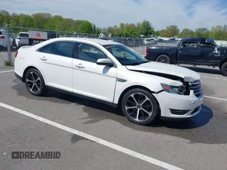 2016 Ford Taurus SEL with VIN 1FAHP2E88GG131659, listed as a IAAI auction lot 42205065 with 99,416 mi miles and . Bid and sale history available at DreamBid. Image 1.