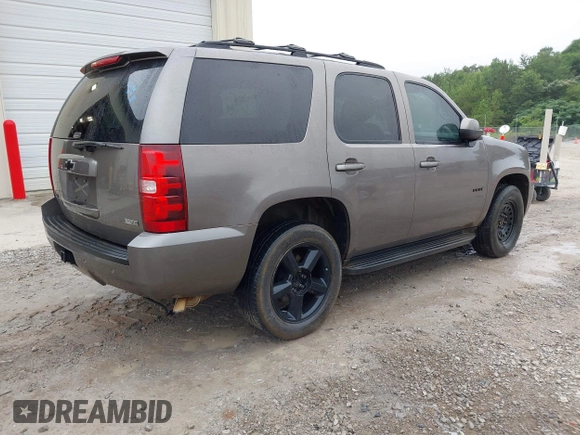 2012 Chevrolet Tahoe LT with VIN 1GNSCBE01CR123298, listed as a IAAI auction lot 42542148 with 203,752 mi miles and . Bid and sale history available at DreamBid. Image 4.