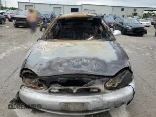 1997 Mercury Sable GS z VIN 1MELM50U4VG609283, wystawiony jako Copart lot #66853354 z przebiegiem Nie podano mil oraz Szkody całkowita. Historia ofert i sprzedaży dostępna na DreamBid. Obrazek 5.