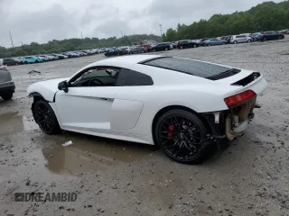 2018 Audi R8 V10 z VIN WUABAAFX5J7902445, wystawiony jako Copart lot #56587934 z przebiegiem Nie podano mil oraz Szkody całkowita. Historia ofert i sprzedaży dostępna na DreamBid. Obrazek 2.