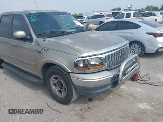2001 Ford F-150 XLT z VIN 1FTRW07W11KB87805, wystawiony jako IAAI lot #42270695 z przebiegiem 204 889 mil mil oraz . Historia ofert i sprzedaży dostępna na DreamBid. Obrazek 1.