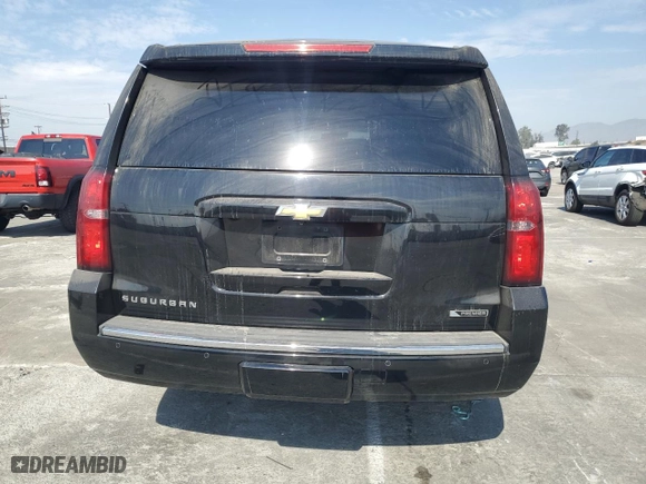 2017 Chevrolet Suburban Premier with VIN 1GNSCJKC0HR140111, listed as a Copart auction lot 74387664 with 104,094 mi miles and Salvage Title. Bid and sale history available at carsss.com. Image 6.