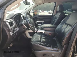 2016 Nissan Titan Platinum Reserve with VIN 1N6BA1F40GN512437, listed as a Copart auction lot 63521325 with 203,879 mi miles and Clean title. Bid and sale history available at DreamBid. Image 7.