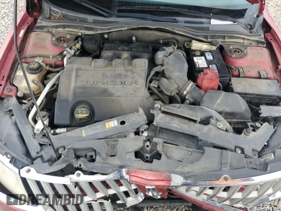 2010 Lincoln MKZ z VIN 3LNHL2GC7AR650494, wystawiony jako Copart lot #55113205 z przebiegiem 187 116 mil mil oraz Szkoda całkowita • Salvage title. Historia ofert i sprzedaży dostępna na DreamBid. Obrazek 11.