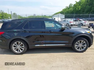 2023 Ford Explorer XLT with VIN 1FMSK8DH2PGA54527, listed as a IAAI auction lot 42463206 with 26,420 mi miles and . Bid and sale history available at DreamBid. Image 13.