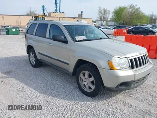 2008 Jeep Grand Cherokee Laredo with VIN 1J8GR48K88C107253, listed as a IAAI auction lot 42018165 with 239,222 mi miles. Bid and sale history available at carsss.com. Image 1.