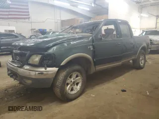 2002 Ford F-150 XLT with VIN 1FTRW08L22KC13446, listed as a Copart auction lot 51702495 with 0 mi miles and Salvage Title. Bid and sale history available at carsss.com. Image 1.