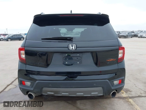 2023 Honda Passport TrailSport with VIN 5FNYF8H67PB006933, listed as a IAAI auction lot 41597859 with 34,145 mi miles and . Bid and sale history available at carsss.com. Image 17.