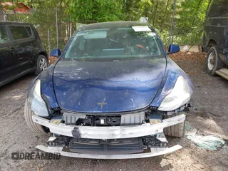 2018 Tesla Model 3 Long Range Battery with VIN 5YJ3E1EA2JF040914, listed as a IAAI auction lot 42120091 with 138,130 mi miles and . Bid and sale history available at DreamBid. Image 11.