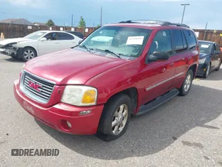 2002 GMC Envoy SLT z VIN 1GKDT13S922268682, wystawiony jako IAAI lot #42348610 z przebiegiem 191 745 mil mil oraz . Historia ofert i sprzedaży dostępna na DreamBid. Obrazek 2.