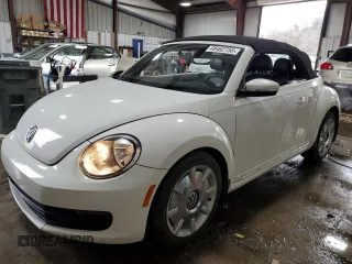 2014 Volkswagen Beetle 2.5L w/Sound/Nav с VIN 3VW5P7AT3EM801803, выставлен на аукционе Copart как лот 48462755 с пробегом 73 752 миль миль и Списание • Salvage title. История ставок и продаж доступна на DreamBid. Изображение 1.