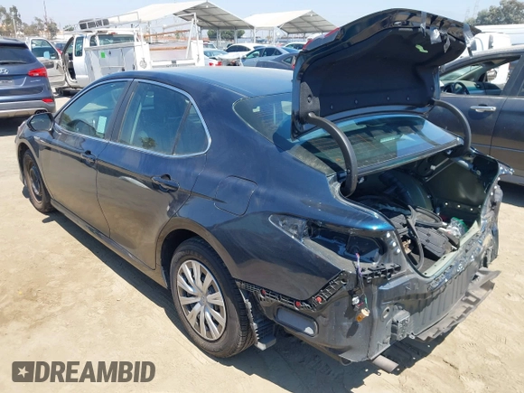2021 Toyota Camry Hybrid LE with VIN 4T1C31AK5MU552226, listed as a IAAI auction lot 40210726 with 107,331 mi miles. Bid and sale history available at carsss.com. Image 3.