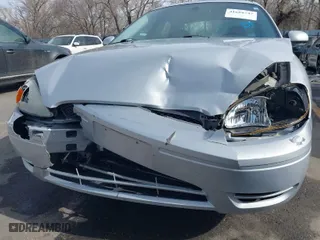 2004 Ford Taurus SEL with VIN 1FAFP56SX4A156094, listed as a IAAI auction lot 41688747 with 126,339 mi miles. Bid and sale history available at carsss.com. Image 6.