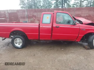 1997 Ford Ranger XL z VIN 1FTCR14A8VPA82103, wystawiony jako IAAI lot #40809996 z przebiegiem Nie podano mil oraz . Historia ofert i sprzedaży dostępna na DreamBid. Obrazek 13.