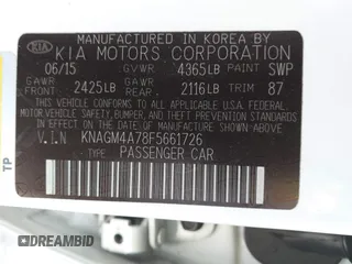 2015 Kia Optima LX with VIN KNAGM4A78F5661726, listed as a IAAI auction lot 42161244 with 105,521 mi miles. Bid and sale history available at carsss.com. Image 9.