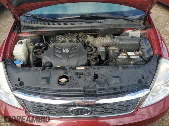 2012 Kia Sedona EX with VIN KNDMH4C74C6497419, listed as a Copart auction lot 72339504 with 142,115 mi miles and Salvage Title. Bid and sale history available at carsss.com. Image 12.