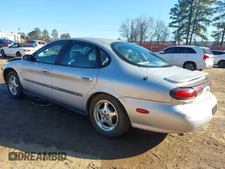1999 Ford Taurus SE with VIN 1FAFP53S6XA322930, listed as a IAAI auction lot 41422655 with 189,696 mi miles. Bid and sale history available at carsss.com. Image 3.