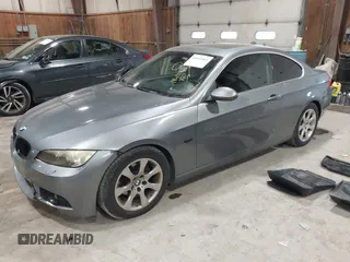 2007 BMW 3 Series 328xi with VIN WBAWC33517PC87084, listed as a IAAI auction lot 41611461 with 196,537 mi miles and . Bid and sale history available at DreamBid. Image 17.