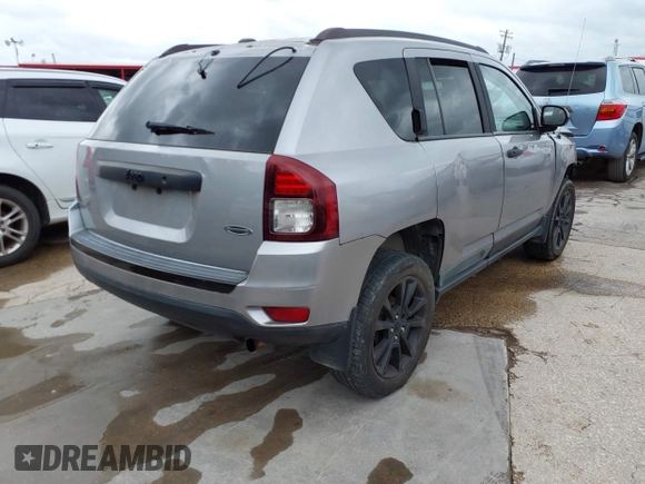 2014 Jeep Compass Sport with VIN 1C4NJCBA3ED769764, listed as a IAAI auction lot 42147739 with 141,979 mi miles. Bid and sale history available at carsss.com. Image 4.