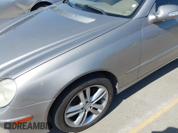 2007 Mercedes-Benz CLK-Class 3.5L with VIN WDBTJ56H47F215889, listed as a IAAI auction lot 42109563 with 106,593 mi miles. Bid and sale history available at carsss.com. Image 6.
