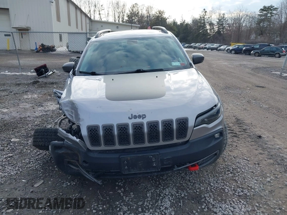 2019 Jeep Cherokee Trailhawk with VIN 1C4PJMBX5KD103259, listed as a IAAI auction lot 41704861 with 39,923 mi miles and . Bid and sale history available at DreamBid. Image 12.
