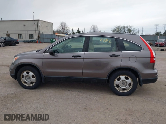 2011 Honda CR-V LX with VIN 5J6RE4H3XBL064637, listed as a IAAI auction lot 42002382 with 192,732 mi miles. Bid and sale history available at carsss.com. Image 14.