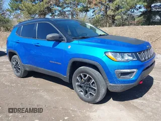 2019 Jeep Compass Trailhawk with VIN 3C4NJDDB5KT683907, listed as a IAAI auction lot 41876584 with 54,685 mi miles and . Bid and sale history available at DreamBid. Image 1.