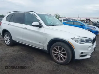 2016 BMW X5 xDrive35i z VIN 5UXKR0C52G0P23718, wystawiony jako IAAI lot #42252448 z przebiegiem 79 128 mil mil oraz . Historia ofert i sprzedaży dostępna na DreamBid. Obrazek 1.