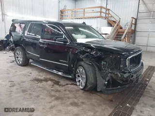 2016 GMC Yukon XL Denali with VIN 1GKS2HKJ6GR433999, listed as a IAAI auction lot 41421698 with 124,586 mi miles. Bid and sale history available at carsss.com. Image 1.