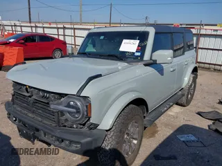 2023 Ford Bronco z VIN 1FMDE5BH5PLB37801, wystawiony jako IAAI lot #41691282 z przebiegiem 21 129 mil mil oraz . Historia ofert i sprzedaży dostępna na DreamBid. Obrazek 18.