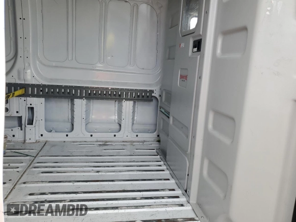 2023 Ford Transit Cargo z VIN 1FTYE1C89PKA17390, wystawiony jako Copart lot #83939214 z przebiegiem 76 099 mil mil oraz Szkoda całkowita • Salvage title. Historia ofert i sprzedaży dostępna na DreamBid. Obrazek 11.