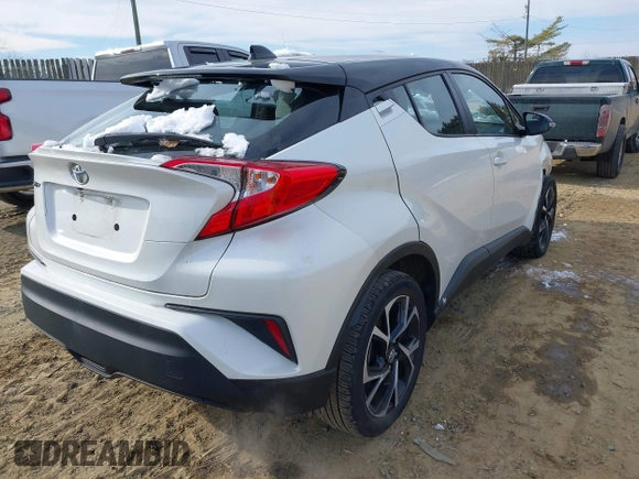 2019 Toyota C-HR XLE with VIN NMTKHMBX9KR075751, listed as a IAAI auction lot 41306015 with 29,078 mi miles. Bid and sale history available at carsss.com. Image 4.