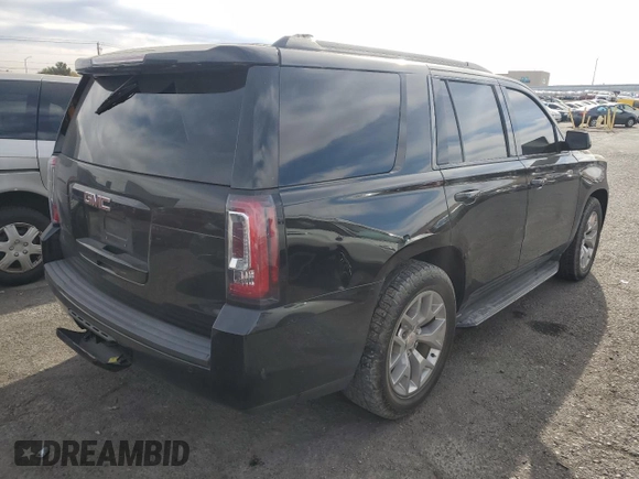 2019 GMC Yukon SLE with VIN 1GKS1AKC2KR101675, listed as a Copart auction lot 87256804 with 144,572 mi miles and Salvage Title. Bid and sale history available at carsss.com. Image 3.