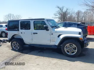 2020 Jeep Wrangler Unlimited Sahara with VIN 1C4HJXEN7LW180589, listed as a IAAI auction lot 41784143 with 58,955 mi miles. Bid and sale history available at carsss.com. Image 14.