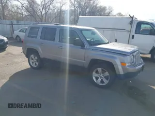 2016 Jeep Patriot High Altitude Edition with VIN 1C4NJRFB1GD712715, listed as a IAAI auction lot 41984245 with 124,227 mi miles. Bid and sale history available at carsss.com. Image 1.