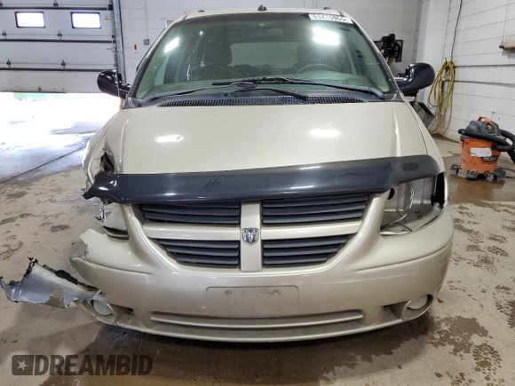 2005 Dodge Caravan SXT with VIN 2D4GP44L65R438530, listed as a Copart auction lot 63415955 with 220,852 mi miles and Salvage title. Bid and sale history available at DreamBid. Image 5.
