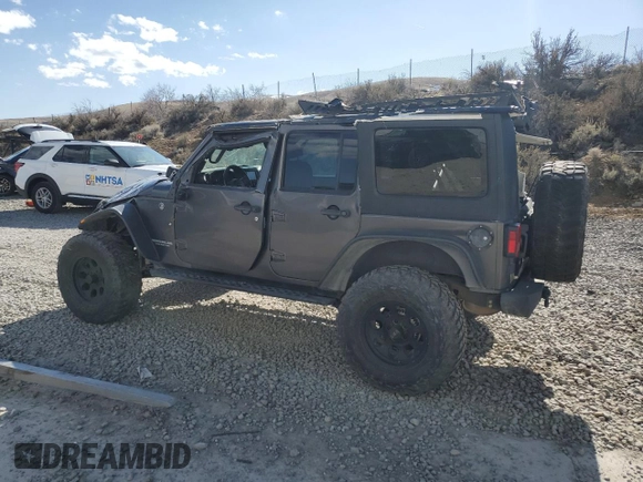 2014 Jeep Wrangler Unlimited Rubicon with VIN 1C4BJWFG0EL274480, listed as a Copart auction lot 48201845 with 130,503 mi miles and Salvage Title. Bid and sale history available at carsss.com. Image 2.