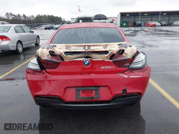 2013 BMW 6 Series 650i with VIN WBAYM9C53DDW20243, listed as a IAAI auction lot 41762838 with 100,905 mi miles and . Bid and sale history available at carsss.com. Image 17.