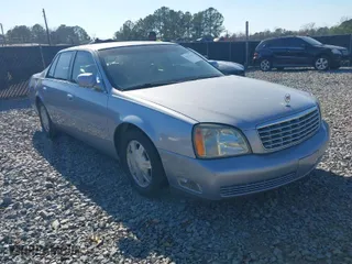 2004 Cadillac DeVille with VIN 1G6KD54YX4U212934, listed as a IAAI auction lot 41673414 with 85,972 mi miles. Bid and sale history available at carsss.com. Image 1.