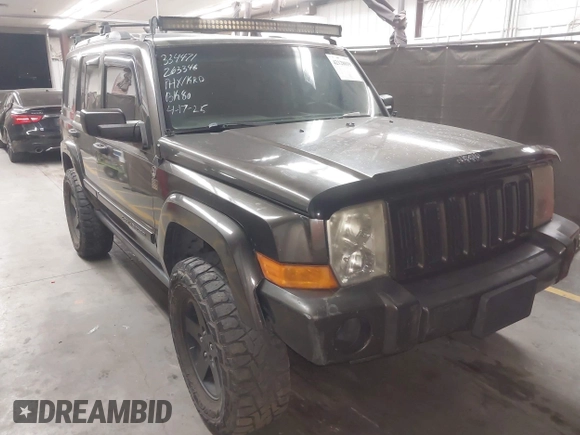 2006 Jeep Commander with VIN 1J8HG48KX6C263348, listed as a IAAI auction lot 42128039 with 208,605 mi miles and . Bid and sale history available at DreamBid. Image 1.