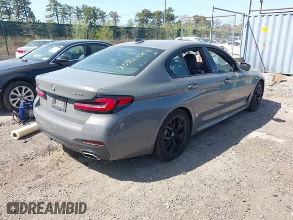 2021 BMW 5 Series 540i xDrive with VIN WBA73BJ03MWX30307, listed as a IAAI auction lot 41891615 with 27,374 mi miles and . Bid and sale history available at DreamBid. Image 4.