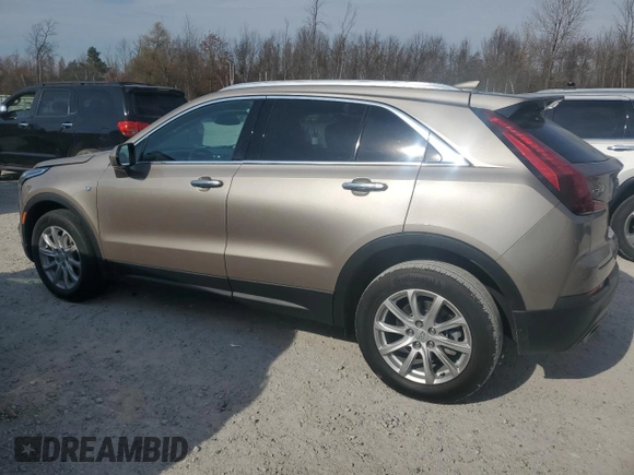 2022 Cadillac XT4 FWD Luxury with VIN 1GYAZAR4XNF121008, listed as a Copart auction lot 77599974 with 29,141 mi miles and Salvage title. Bid and sale history available at DreamBid. Image 2.