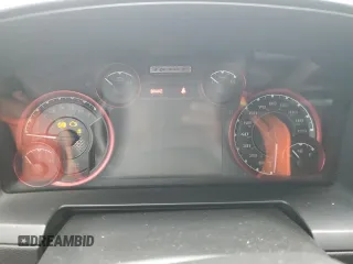 2016 Ram 1500 Rebel z VIN 1C6RR7YT0GS336788, wystawiony jako Copart lot #58507795 z przebiegiem Nie podano mil oraz Szkody całkowita. Historia ofert i sprzedaży dostępna na DreamBid. Obrazek 9.
