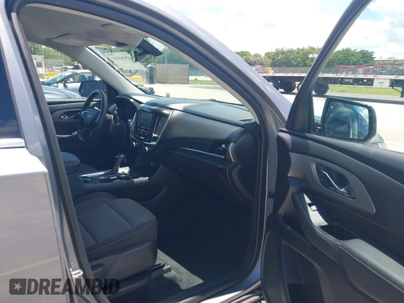 2018 Chevrolet Traverse LS z VIN 1GNEVFKW0JJ202173, wystawiony jako IAAI lot #42494931 z przebiegiem 85 209 mil mil oraz . Historia ofert i sprzedaży dostępna na DreamBid. Obrazek 5.