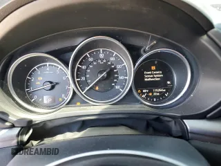 2018 Mazda CX-5 Touring z VIN JM3KFACM5J0338126, wystawiony jako Copart lot #56185795 z przebiegiem 115 254 mil mil oraz Szkoda całkowita • Salvage title. Historia ofert i sprzedaży dostępna na DreamBid. Obrazek 9.