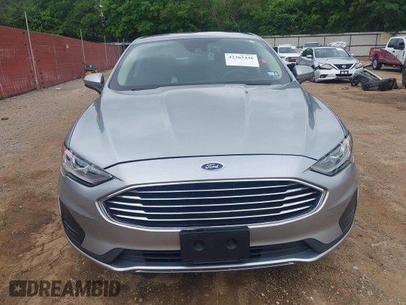 2020 Ford Fusion SE z VIN 3FA6P0LU4LR148070, wystawiony jako IAAI lot #42262446 z przebiegiem 69 057 mil mil oraz . Historia ofert i sprzedaży dostępna na DreamBid. Obrazek 12.